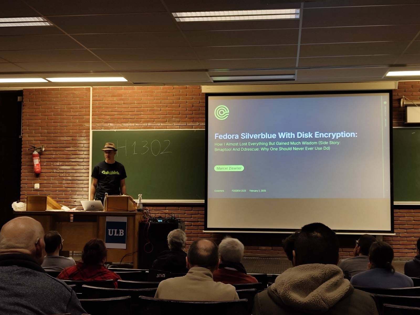 Marcel presenting at FOSDEM 2025