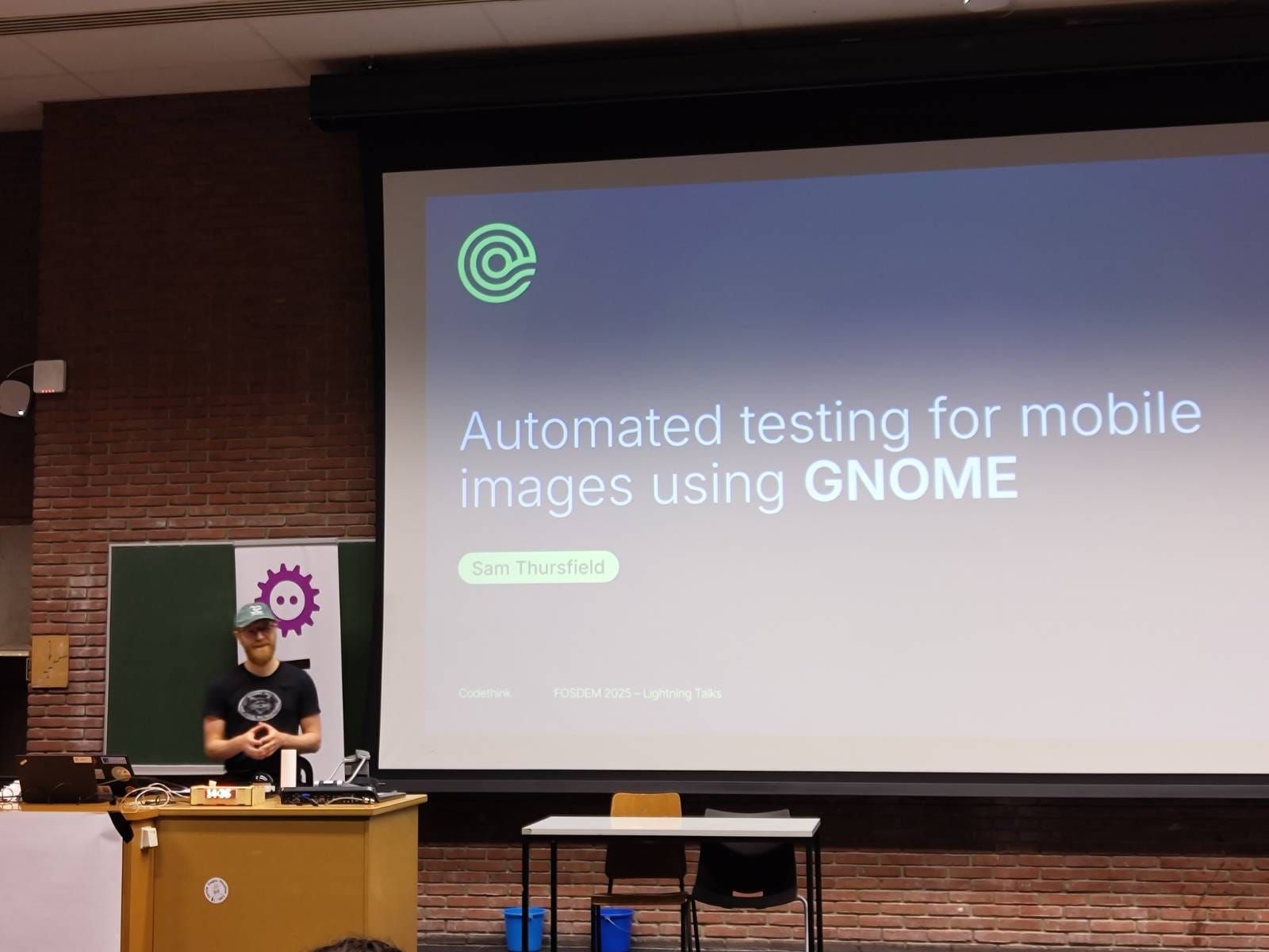 Sam Thursfield presenting at FOSDEM 2025